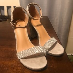 Gray/silver rhinestone heels. Size 8 1/2. Never worn out of the house.